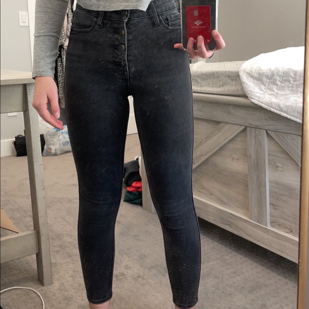 high-rise black faded jeans